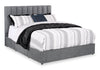 Lit de rangement Amos rembourré en tissu anthracite avec tête de lit à canaux et 3 tiroirs intégrés - format grand lit