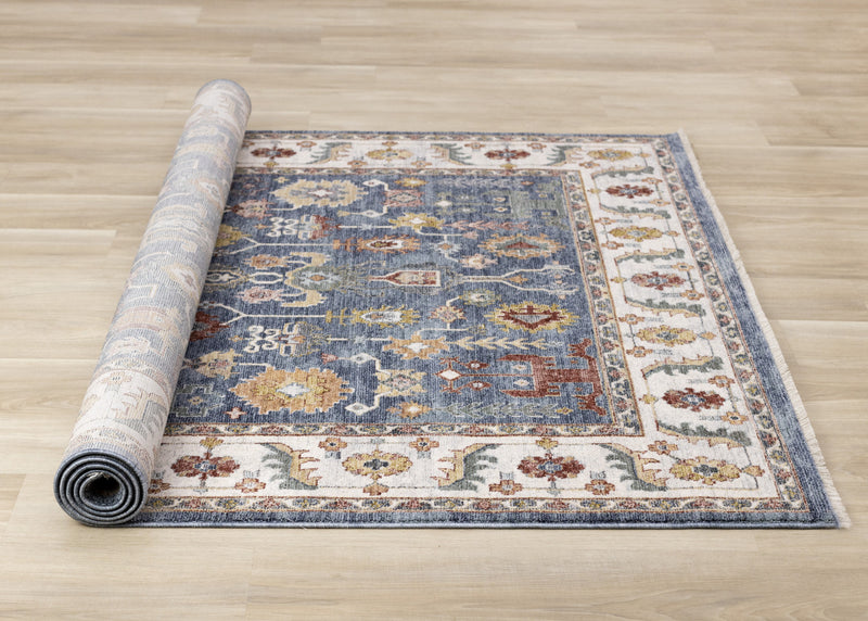 Tapis Olivia bleu a inspire tribal avec bordure, 5'3\" x 7'10\"