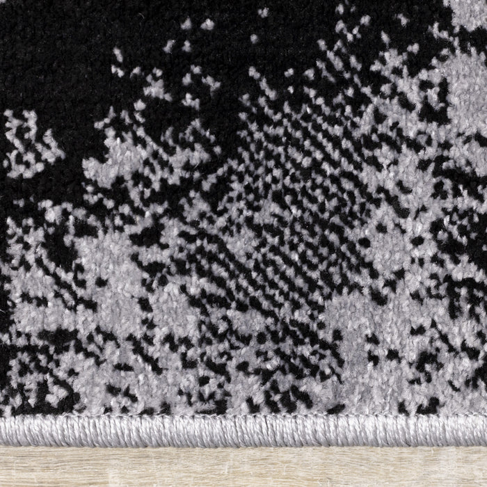 Carpette Covington à motifs de triangles vieillis - 6 pi 7 po x 9 pi 10 po
