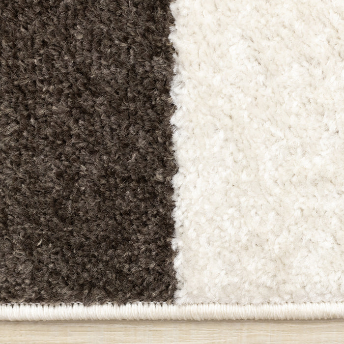 Carpette Marley taupe et sang-de-bœuf à motif de courbes géométriques - 5 pi 3 po x 7 pi 7 po