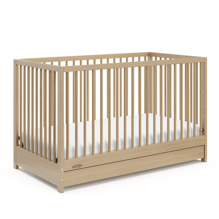 Graco Teddi Lit de bebe convertible 5-en-1 avec tiroir - Bois clair