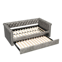 Le Daybed Sophia avec design capitonne, revetement en tissu, lit d'appoint avec trundle et dossier confortable, couleur grise