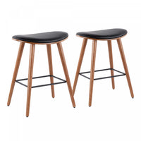 Tabouret moderne du milieu du 20e siècle Saddle de hauteur comptoir en similicuir noir - ensemble de 2