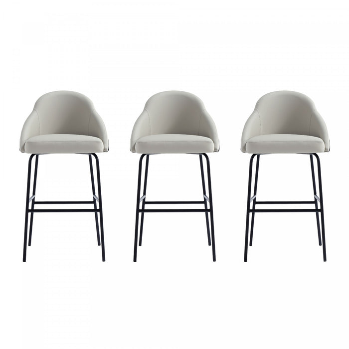 Tabouret de bar moderne en metal Gracie avec revetement en tissu, gris pierre et noir - Lot de 3