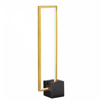 Lampe de table Florence de Dainolite avec base en béton noir mat, fini laiton vieilli et ampoule à DEL de 22 W
