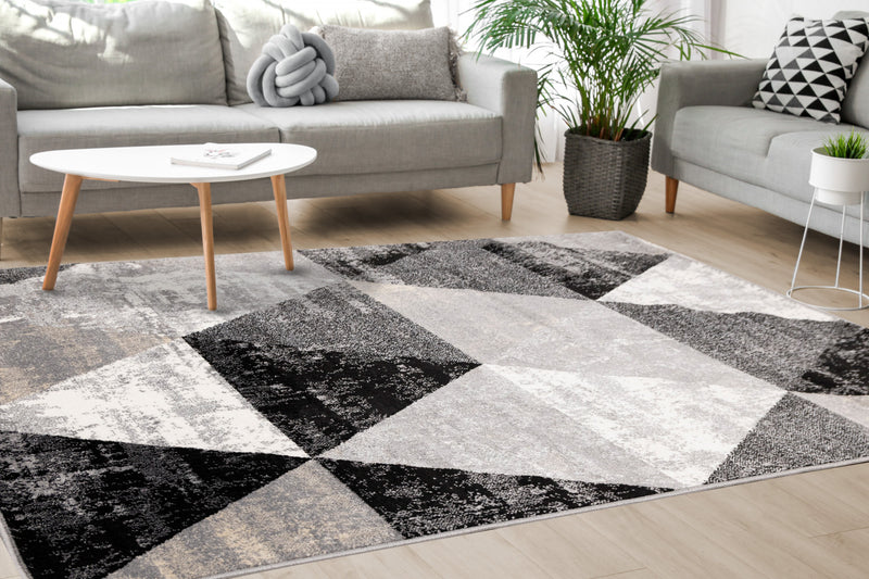 Carpette Covington à motifs de triangles vieillis - 5 pi 3 po x 7 pi 7 po