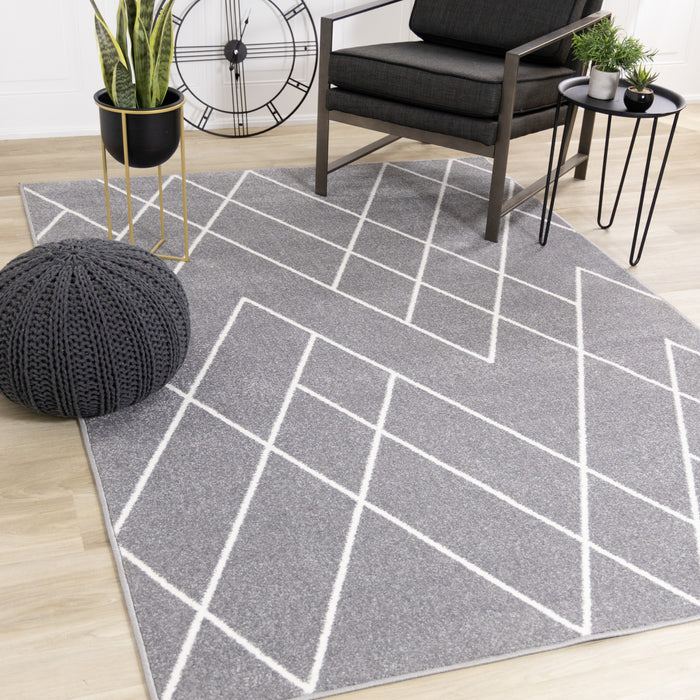 Carpette Covington à motifs de lignes géométriques - 6 pi 7 po x 9 pi 10 po