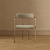 Serene Mid-Century Modern Metal Upholstered Dining Chair in Taupe | Chaise de salle a manger moderne mi-siecle en metal et tissu, coloris taupe, Serene