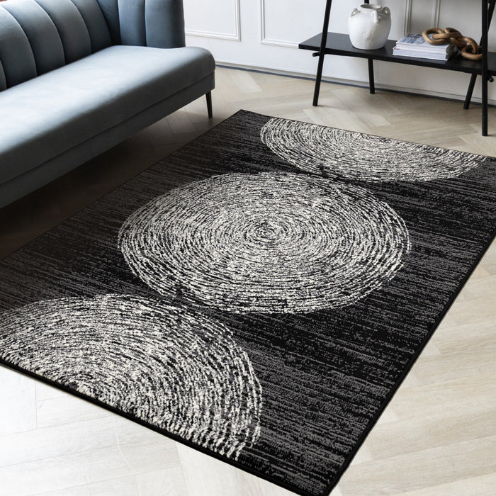 Tapis Florence noir, gris et blanc a motif d'anneaux d'arbre, 6'7\" x 9'6\"