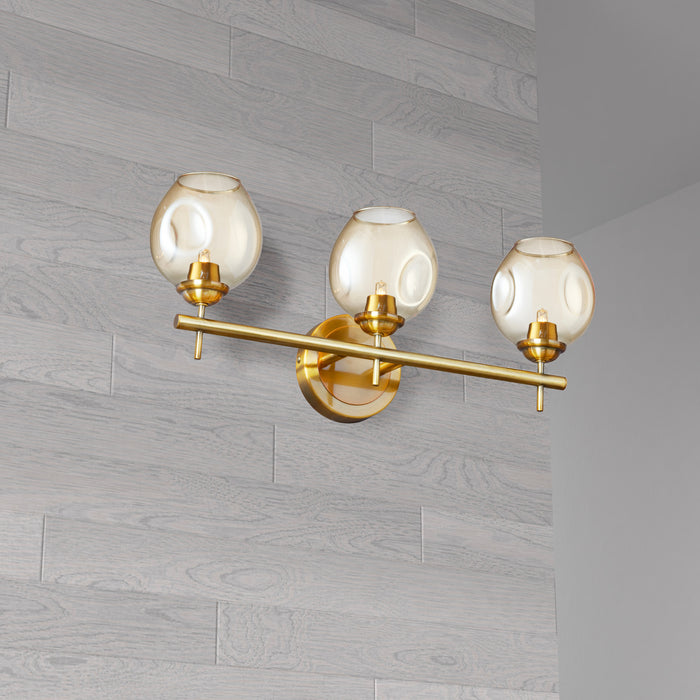 Lumière de coiffeuse Abii de Dainolite en verre champagne, avec fini bronze rétro et 3 ampoules
