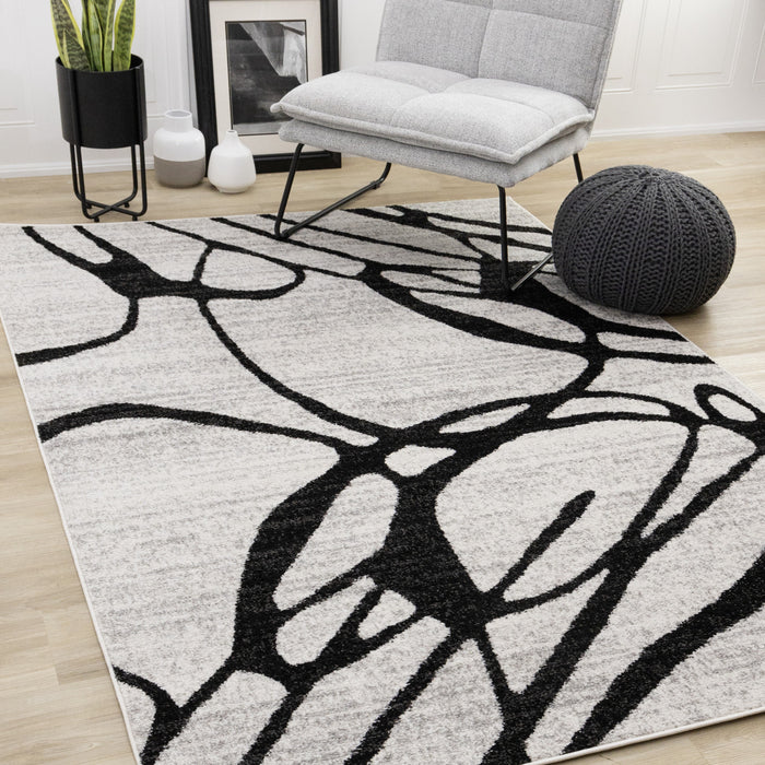 Tapis Emmett gris et noir avec motif tourbillon, 5'3\" x 7'7\"