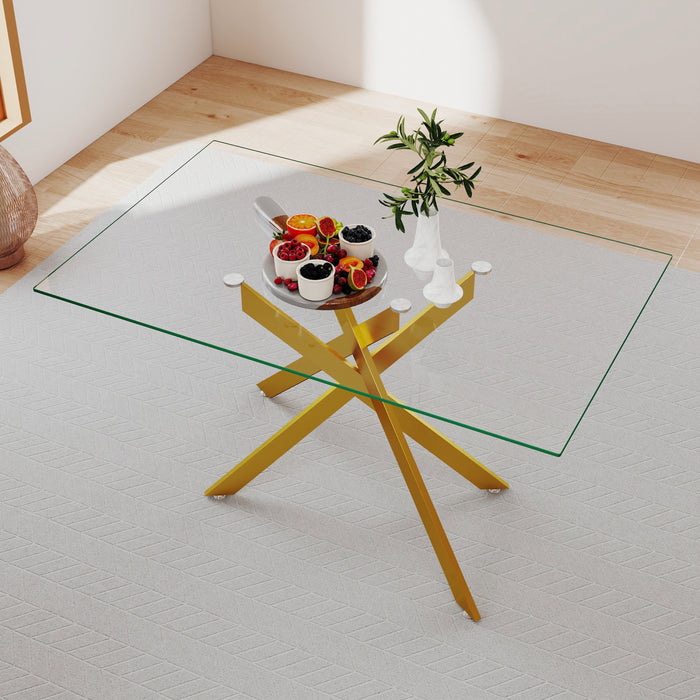 Table a manger rectangulaire en verre trempe de 51,18\" Ethan avec pieds metalliques elegants, doree