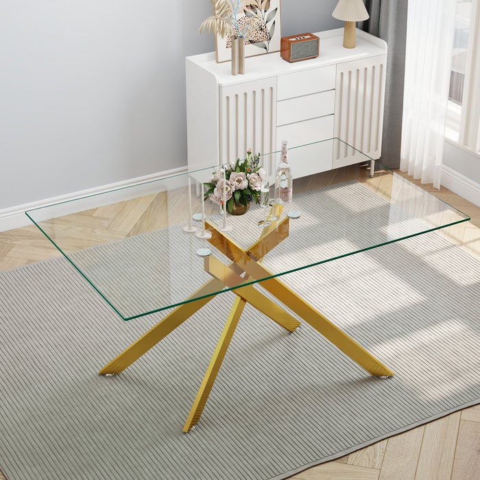 Table a manger rectangulaire en verre trempe de 51,18\" Ethan avec pieds metalliques elegants, doree