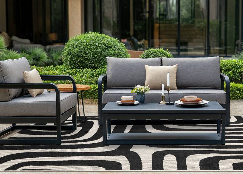 Tapis d'exterieur Jackson a lignes abstraites noires et blanches, 5'3\" x 7'7\"