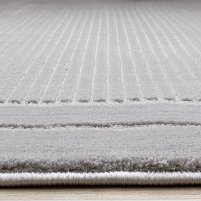 Carpette à poil long et court Ellie en polyester doux texturé à bordure grise - 7 pi 10 po x 10 pi 6 po