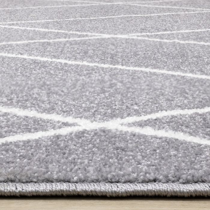 Carpette Covington à lignes géométriques - 7 pi 10 po x 10 pi 6 po