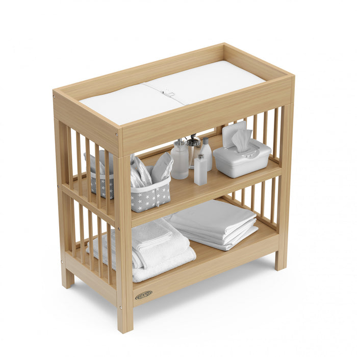 Table a langer Graco Teddi avec matelas a langer resistant a l’eau – Bois flotte