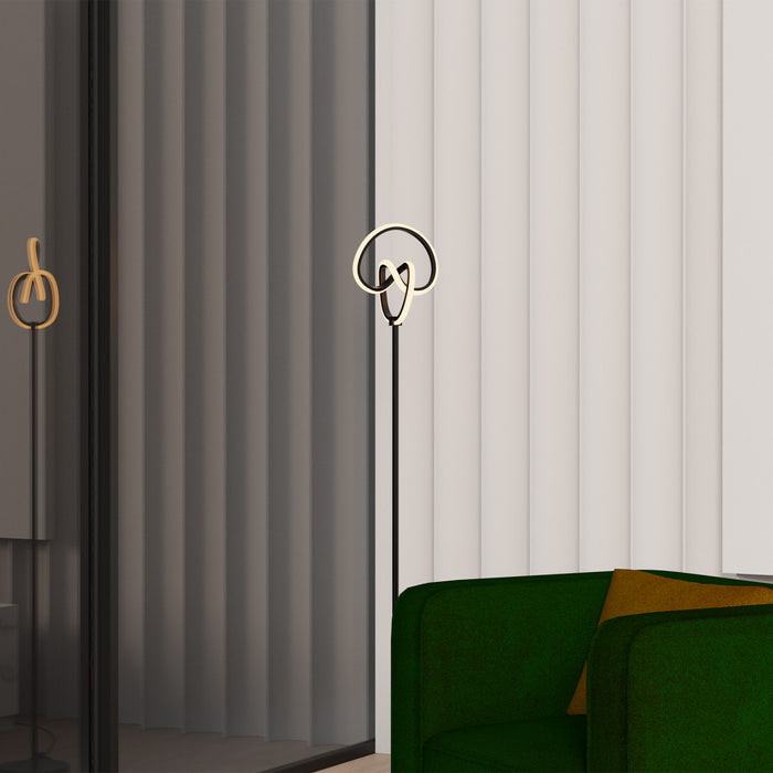 Lampe à pied à conception circulaire tordue à DEL de 58 po noir mat