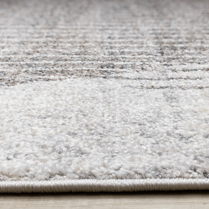 Carpette à poil court doux Solace grise et blanche à motif de cercles qui fusionnent - 6 pi 7 po x 9 pi 6 po