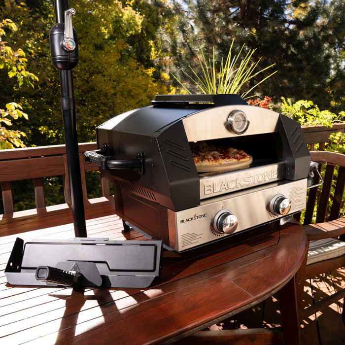 Four à pizza portatif Griddle Essentials de Blackstone avec pierre en cordiérite de 15 po - 6964