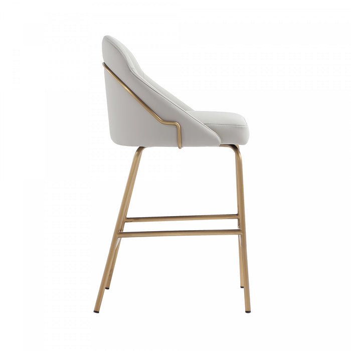 Tabouret de comptoir moderne en metal Gracie avec revetement en tissu, gris pierre et or - Lot de 3