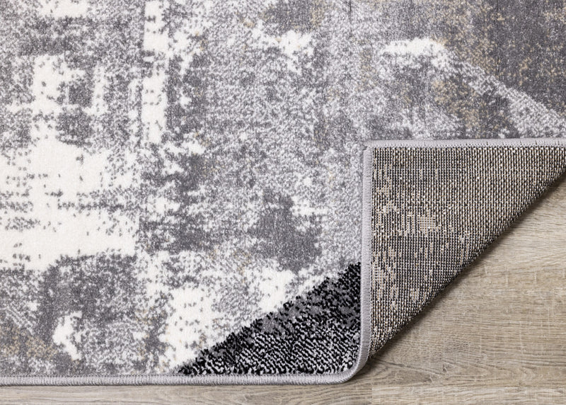 Carpette Covington à motifs de triangles vieillis - 6 pi 7 po x 9 pi 10 po