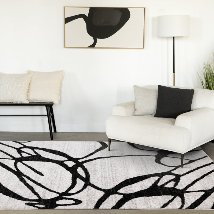 Tapis Emmett gris et noir avec motif tourbillon, 7'10\" x 10'6\"