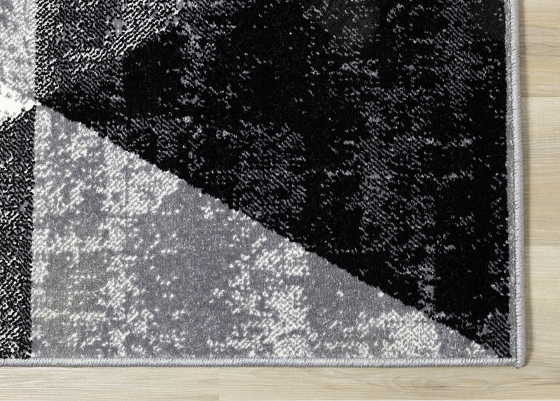 Tapis Covington triangle geometrique noir blanc gris vieilli, 5'3\" x 7'7\"