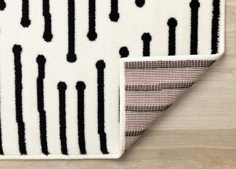 Carpette Forte noire et blanche à motif de rayures - 7 pi 9 po x 10 pi 6 po