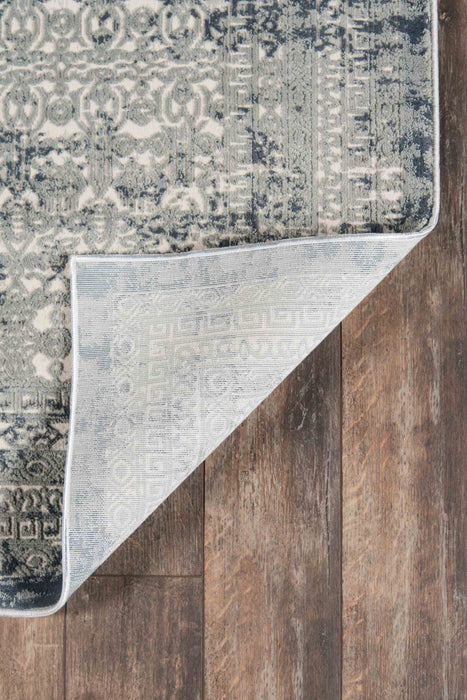 Tapis Traditionnel Mabel 5'1\" x 7'7\" en Vert