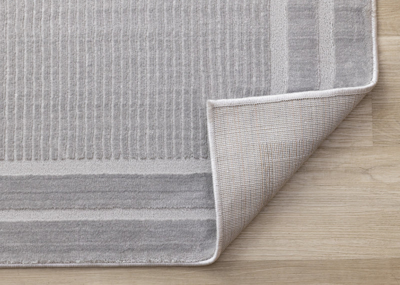 Carpette à poil long et court Ellie en polyester doux texturé à bordure grise - 5 pi 3 po x 7 pi 7 po
