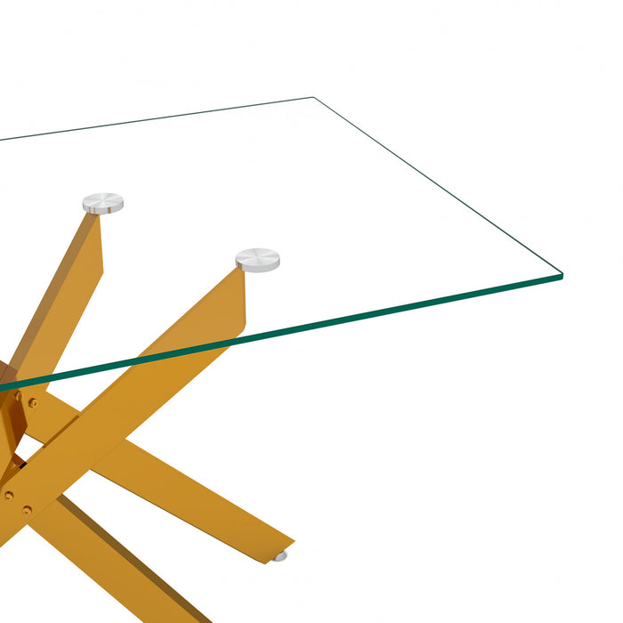 Table a manger rectangulaire en verre trempe de 51,18\" Ethan avec pieds metalliques elegants, doree