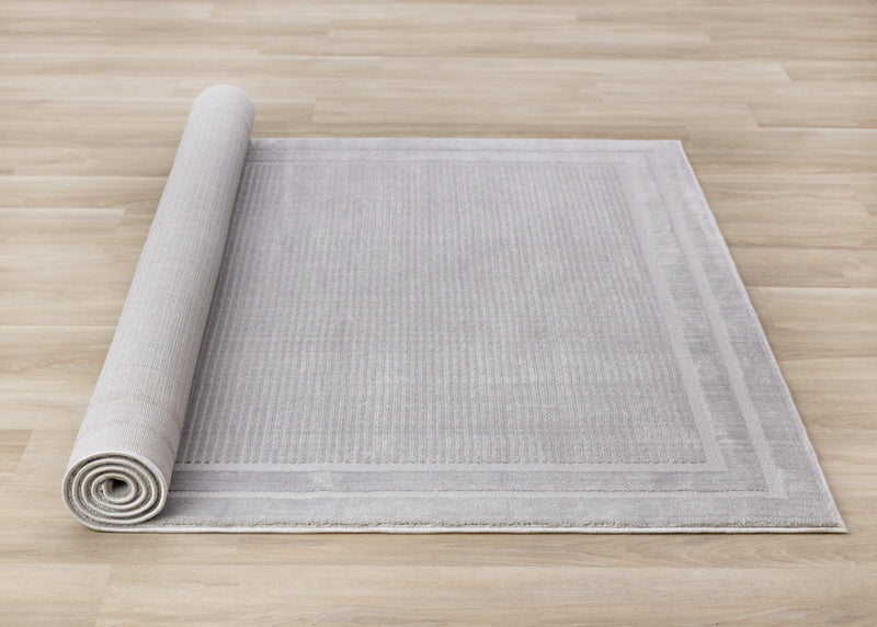Carpette à poil long et court Ellie en polyester doux texturé à bordure grise - 5 pi 3 po x 7 pi 7 po