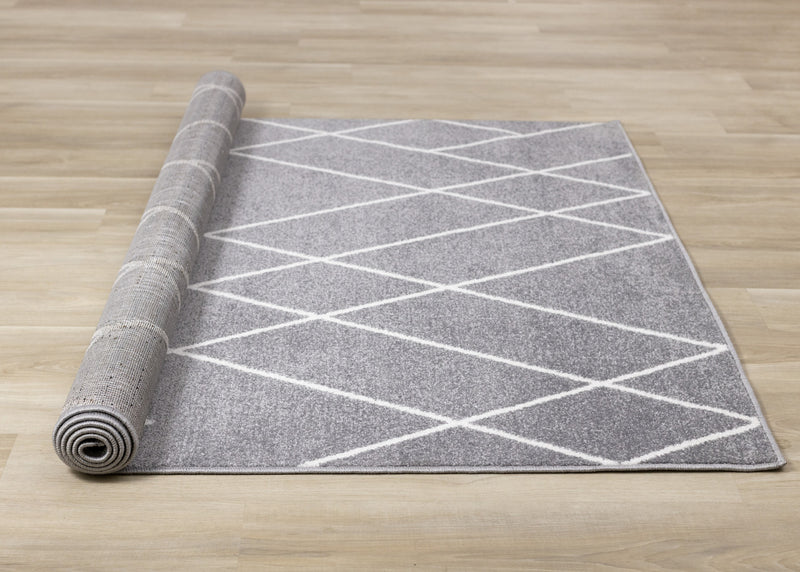 Carpette Covington à motifs de lignes géométriques - 6 pi 7 po x 9 pi 10 po