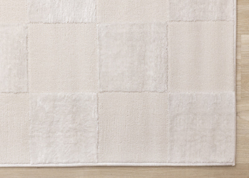 Carpette Leonardo blanche et grise à motif à carreaux - 2 pi 7 po x 4 pi 11 po