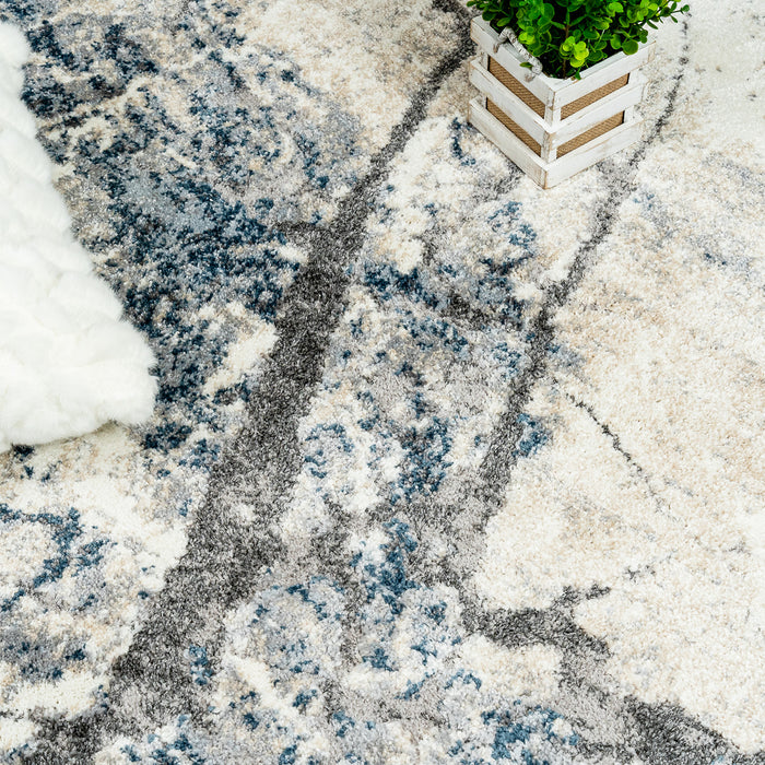 Carpette Darius bleue à motif d'éclair - 6 pi 7 po x 9 pi 6 po