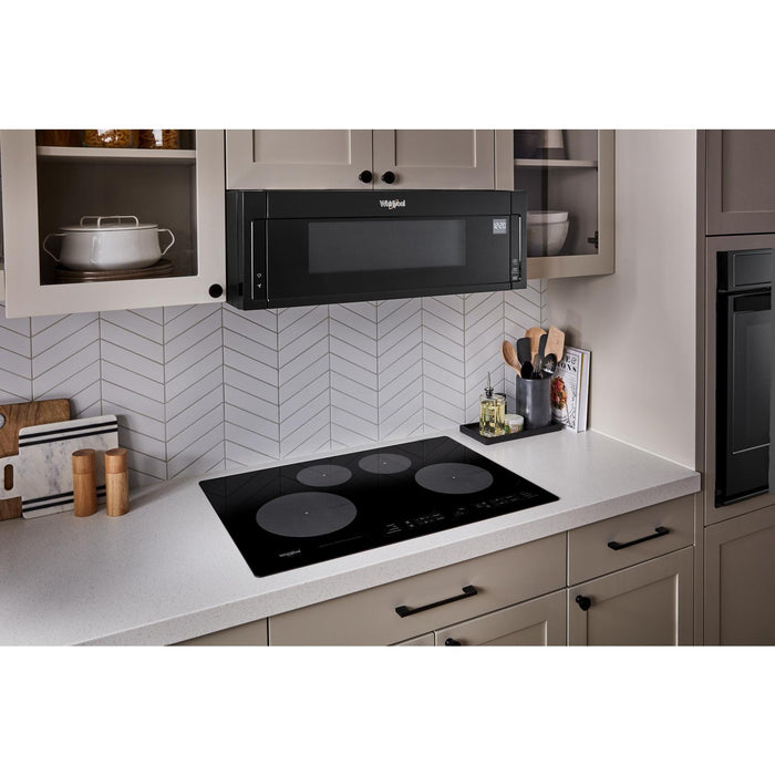 Surface de cuisson à induction Whirlpool de 31 po à 4 éléments - noire - WCI55US0JB