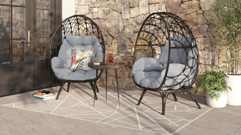 Fauteuil en forme d’œuf Coco de Kort & Co. pour la terrasse à l’extérieur - osier en résine tressé à la main, résistant aux rayons UV et aux intempéries - gris foncé et gris