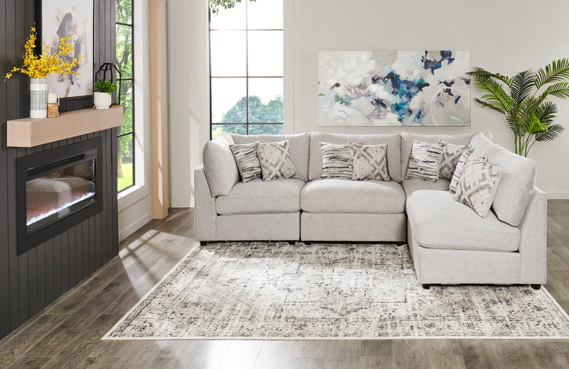 Sofa sectionnel modulaire de style cocon Evolve de Scott Living 4 pièces en tissu d’apparence lin avec coussins en duvet et plumes - gris