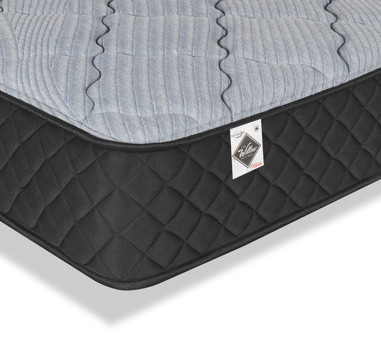 Matelas semi-ferme à plateau régulier dans une boîte Red Cedar de Springwall pour lit simple