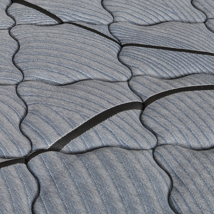 Matelas semi-ferme à plateau régulier dans une boîte Red Cedar de Springwall pour lit simple