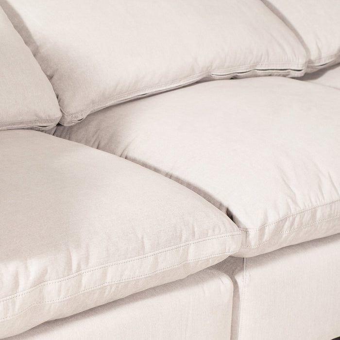 Sofa sectionnel modulaire Eclipse 6 pièces en tissu d’apparence lin avec poufs et coussins réversibles en duvet et plumes - blanc lin