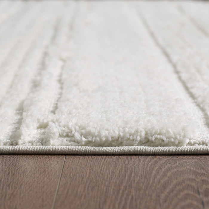 Carpette Riley crème abstraite - 7 pi 7 po x 10 pi