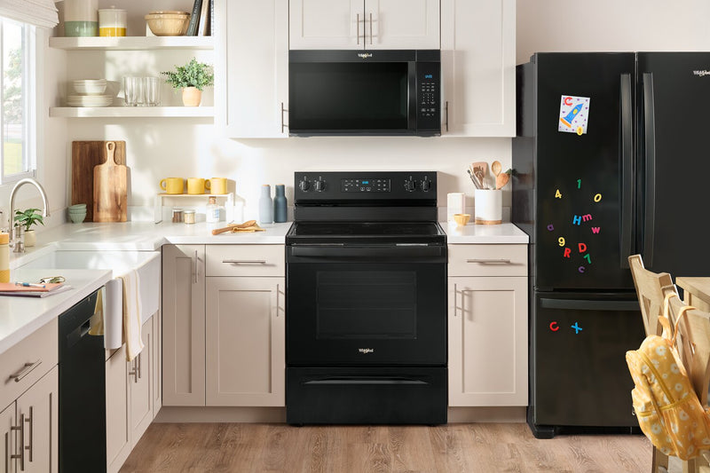 Four à micro-ondes à hotte intégrée Whirlpool de 1,7 pi3 - noir - YWMMS3130RB