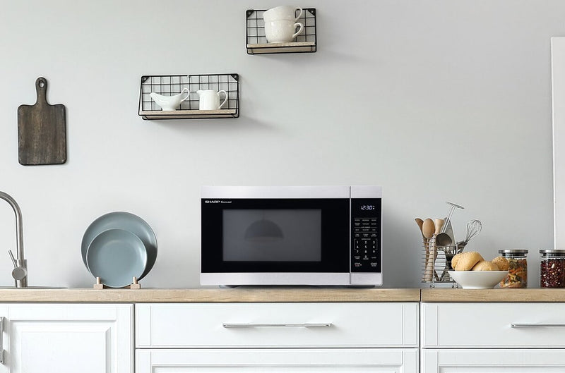 Four à micro-ondes de comptoir Sharp de 1,1 pi3 avec plateau tournant CarouselMD - SMC1162KSC