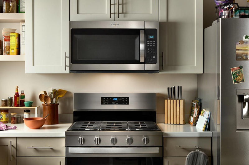 Four à micro-ondes à hotte intégrée Whirlpool de 1,9 pi³ avec cuisson par capteur - noir - YWMMS3230SB