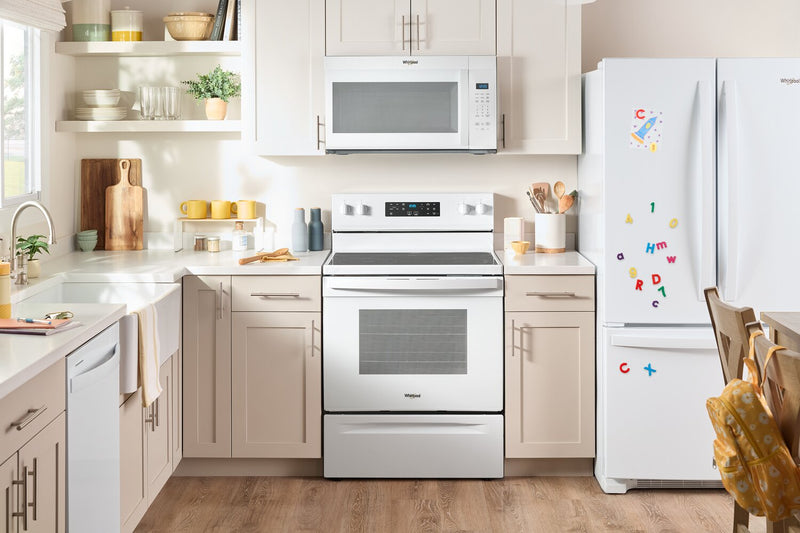 Four à micro-ondes à hotte intégrée Whirlpool de 1,7 pi3 - blanc - YWMMS3130RW