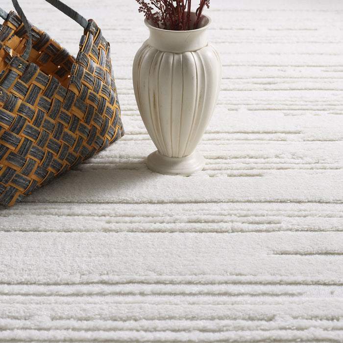 Carpette Riley crème abstraite - 6 pi 3 po x 9 pi