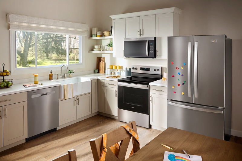 Four à micro-ondes à hotte intégrée Whirlpool de 1,7 pi3 - acier inoxydable résistant aux traces de doigts - YWMMS3130RZ