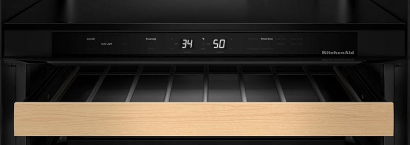 Cellier à vin KitchenAid de 24 po sous le comptoir avec grilles à extension complète à devant en bois - Minerai noir - KUWR524SBE